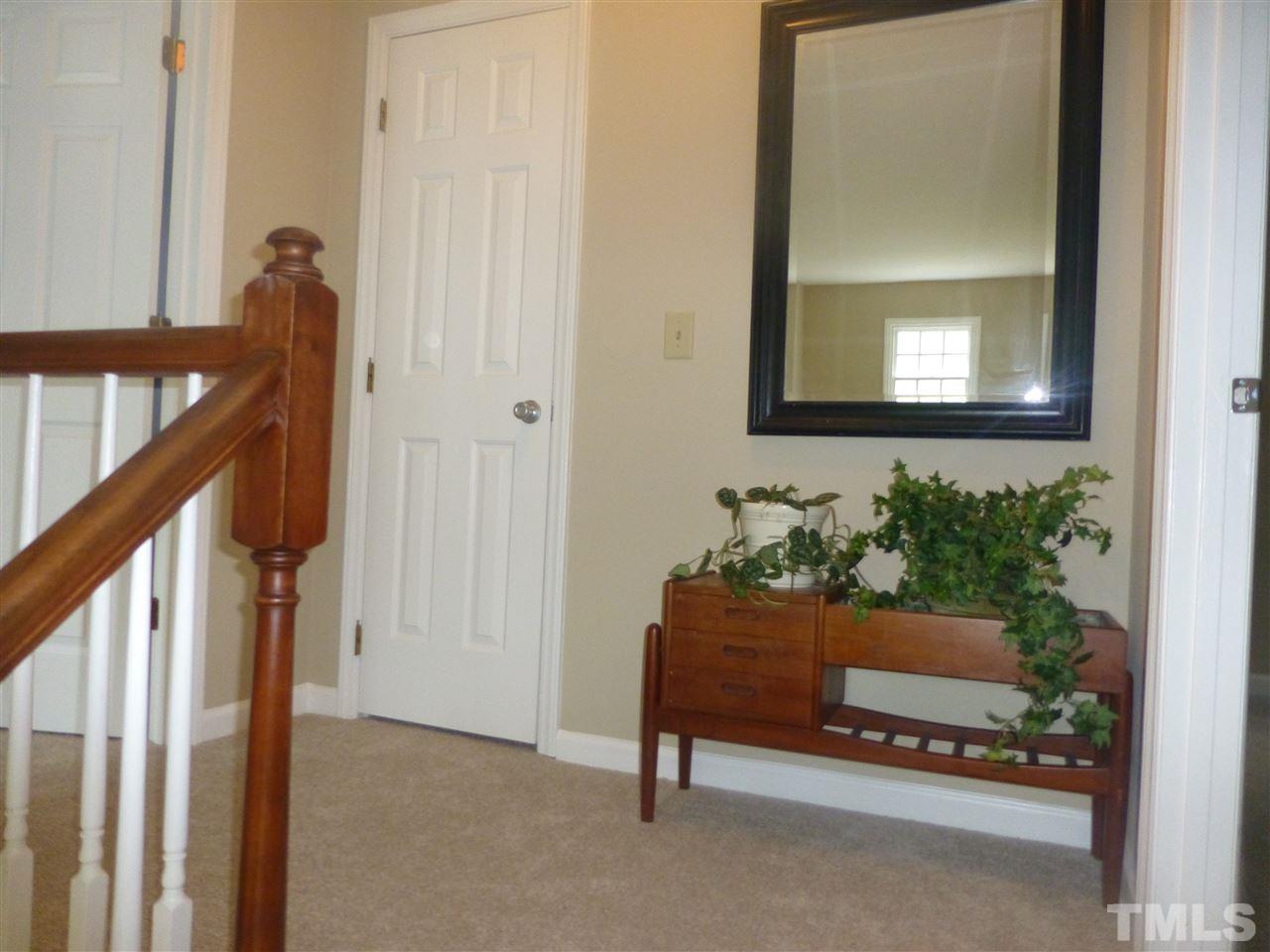 3612 Epperly Court Raleigh, NC 27616 - Photo 22 of 25 a stairs room with furniture