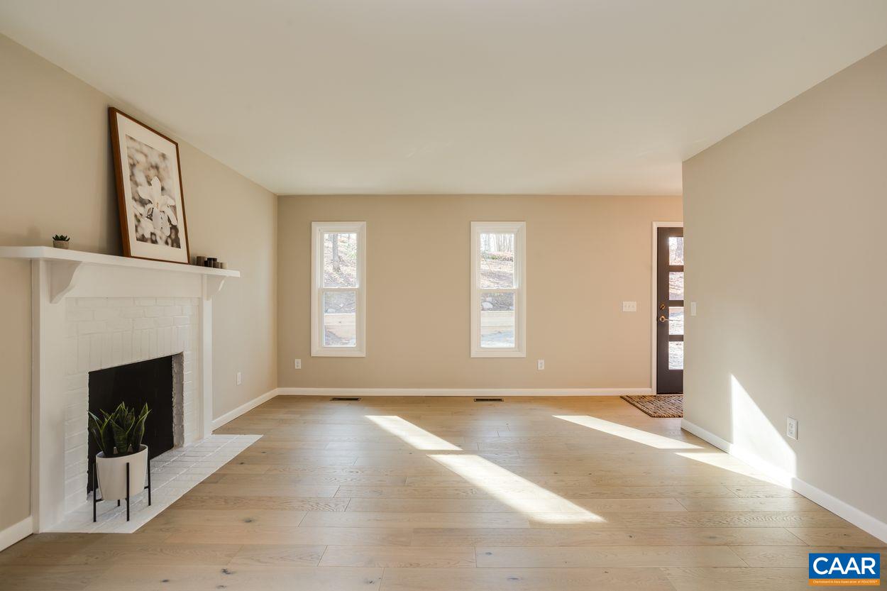 321 Gillums Ridge Road Charlottesville, VA 22903 - Photo 10 of 61 a view of a livingroom with a fireplace