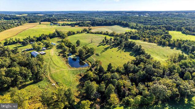 11802 B Renner Road Keymar, MD 21757 - Photo 3 of 11 a view of a swimming pool with a yard