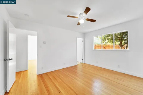 a view of a livingroom with wooden floor