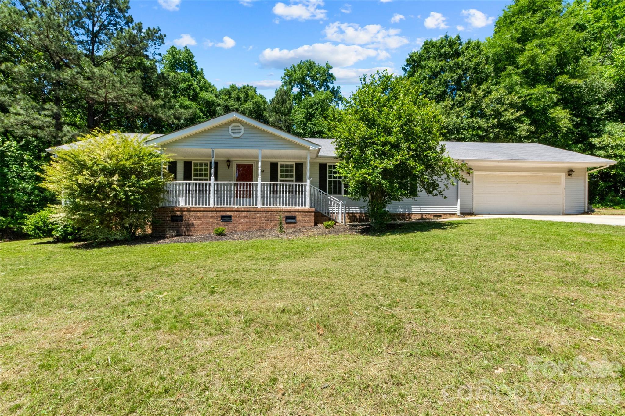 434 Rutledge Drive Catawba, SC 29704 - Photo 2 of 39 a front view of a house with garden