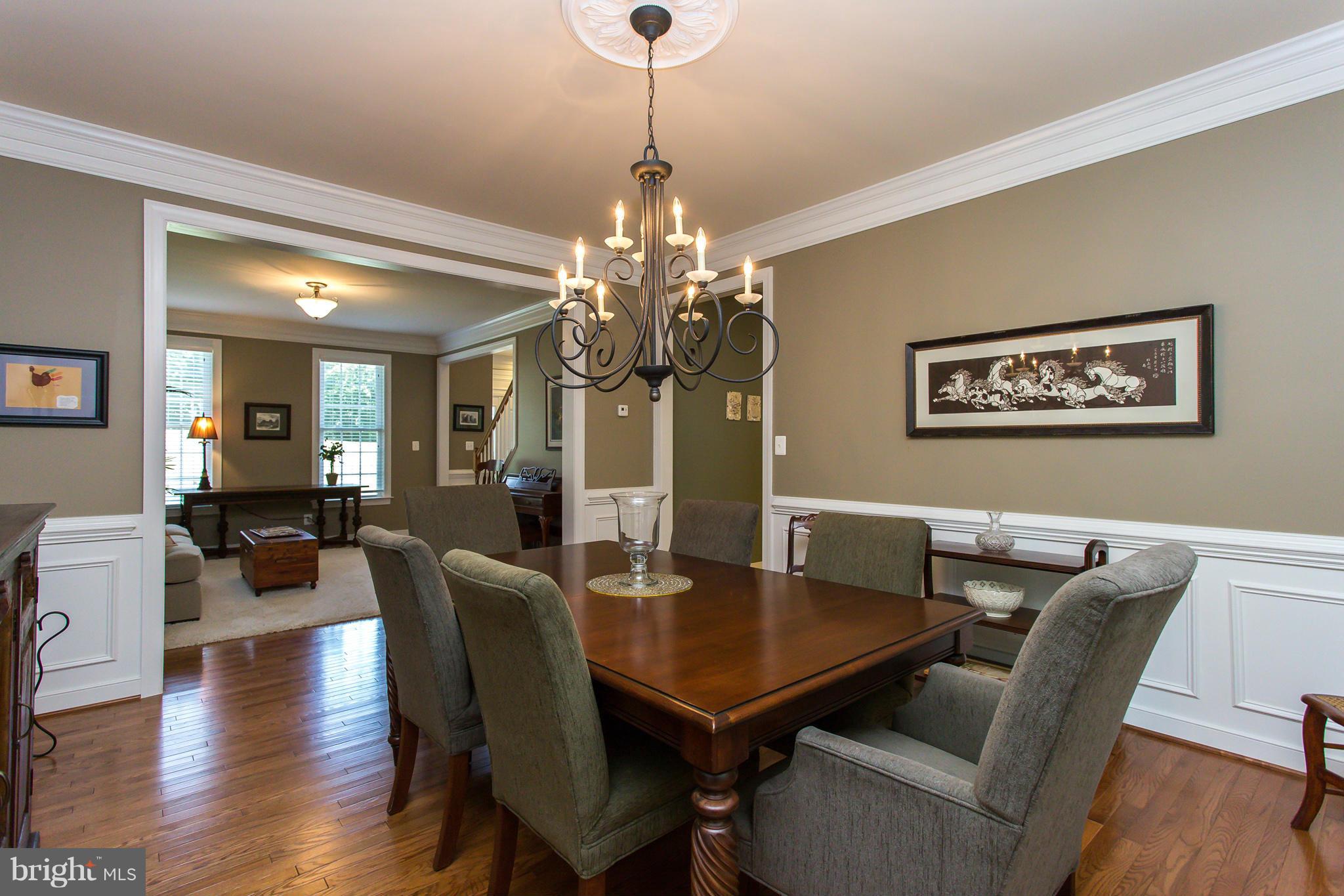 100 Marsh Run Road Fredericksburg, VA 22406 - Photo 6 of 30 Wood floors, chair railing and crown molding.