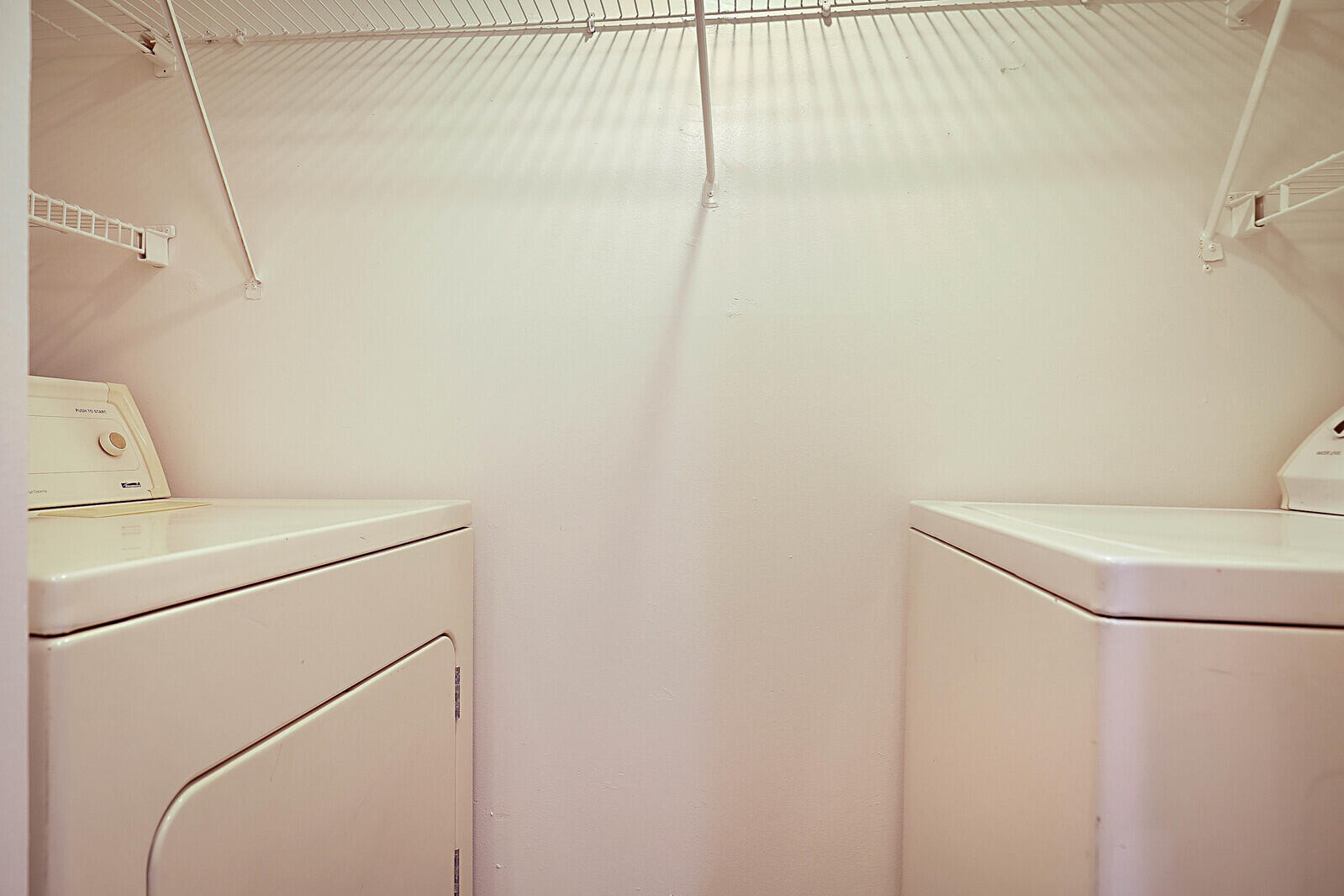 253 Woodland Road Palm Springs, FL 33461 - Photo 17 of 27 a utility room with dryer and washer