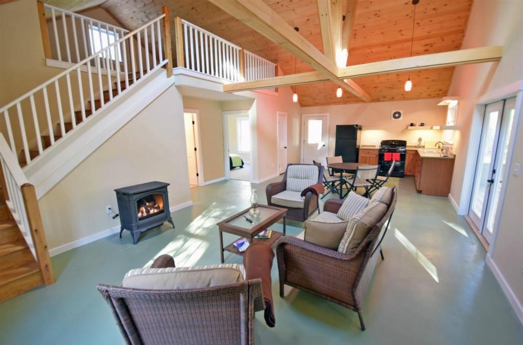 213 Tannery Brook Road Ellsworth, ME 04605 - Photo 12 of 35 View of living room, dining and...