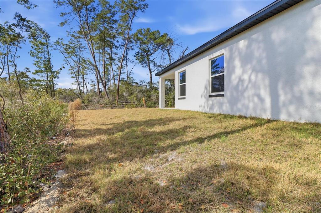 16604 Southwest 21st Circle Ocala, FL 34473 - Photo 38 of 43 a house view with yard