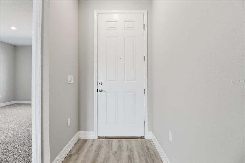 16604 Southwest 21st Circle Ocala, FL 34473 - Photo 7 of 43 a view of a room with wooden floor