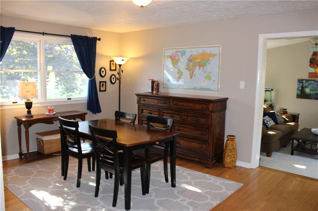 111 Cross Monaca, PA 15061 - Photo 5 of 24 Beautiful Dining Room with Large Window and Harwood Floors-Opens into Kitchen and Living Room