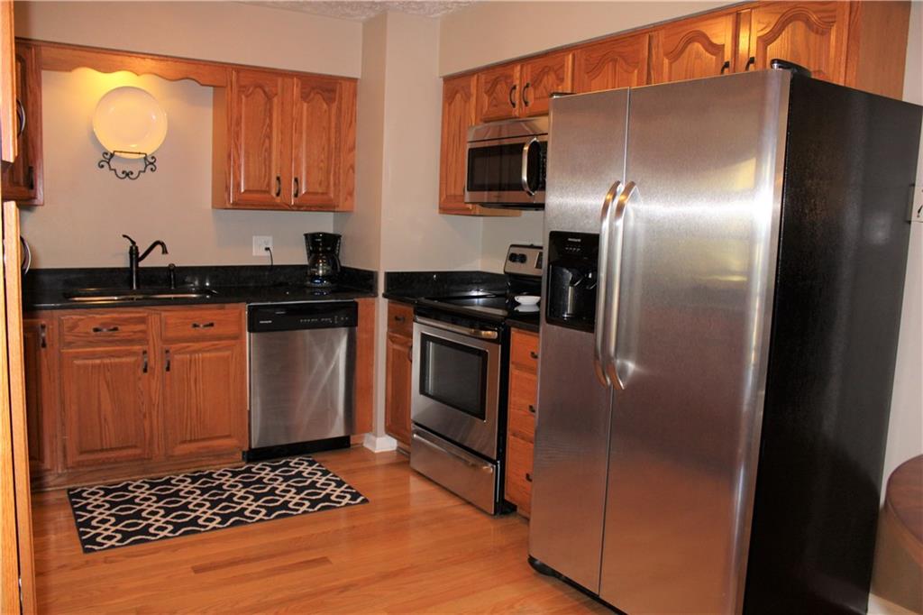 111 Cross Monaca, PA 15061 - Photo 8 of 24 Updated Kitchen with Stainless Appliances and Granite Counters