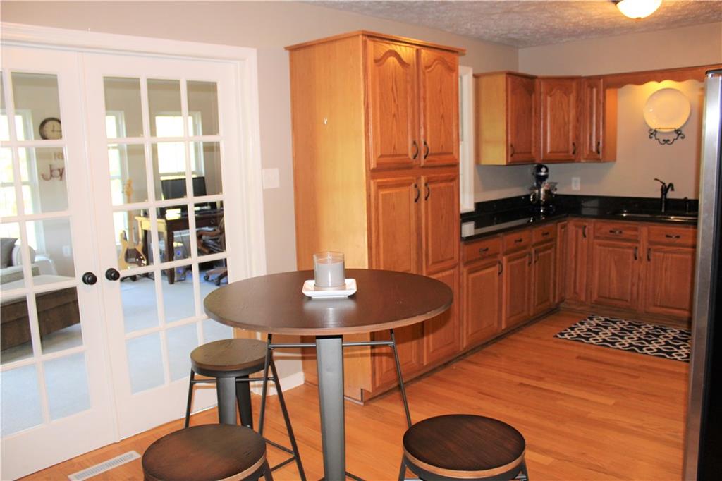 111 Cross Monaca, PA 15061 - Photo 10 of 24 Double French Doors in Kitchen Opens Into 4 Seasons Room