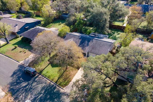 an aerial view of a house with garden