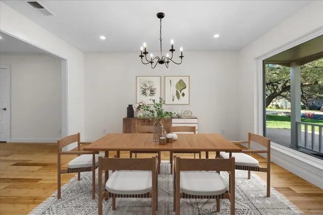 a view of a dining room with furniture window and outside view