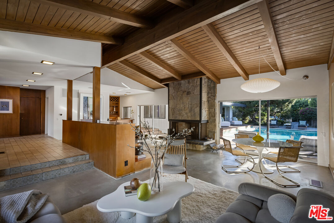 9440 Gallatin Road Downey, CA 90240 - Photo 13 of 55 a living room with furniture and a large window
