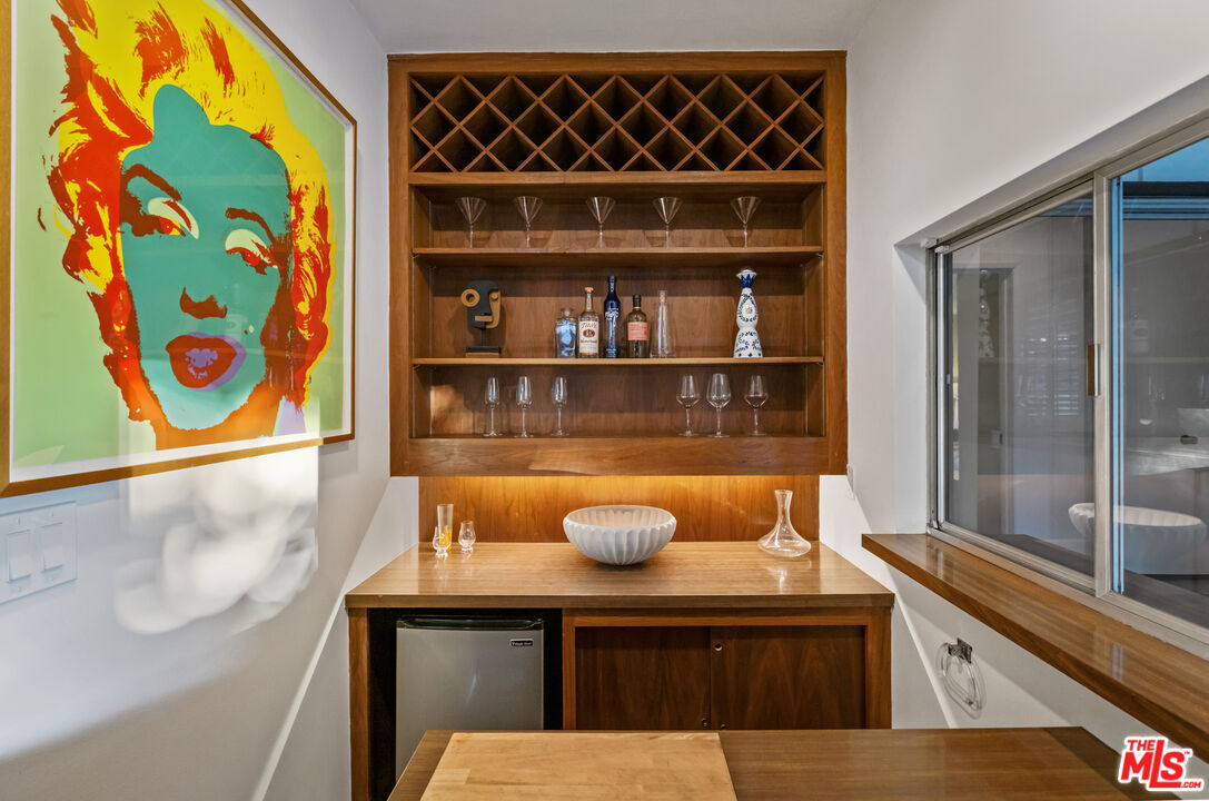 9440 Gallatin Road Downey, CA 90240 - Photo 16 of 55 a kitchen with a sink and a mirror