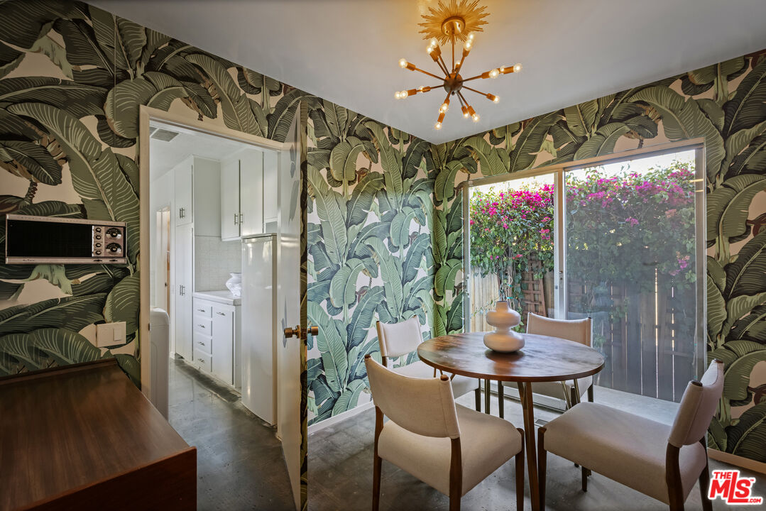 9440 Gallatin Road Downey, CA 90240 - Photo 22 of 55 a view of a dining room with furniture window and outside view