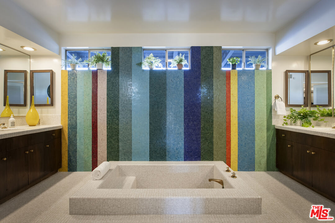 9440 Gallatin Road Downey, CA 90240 - Photo 26 of 55 a bathroom with a bathtub and a sink