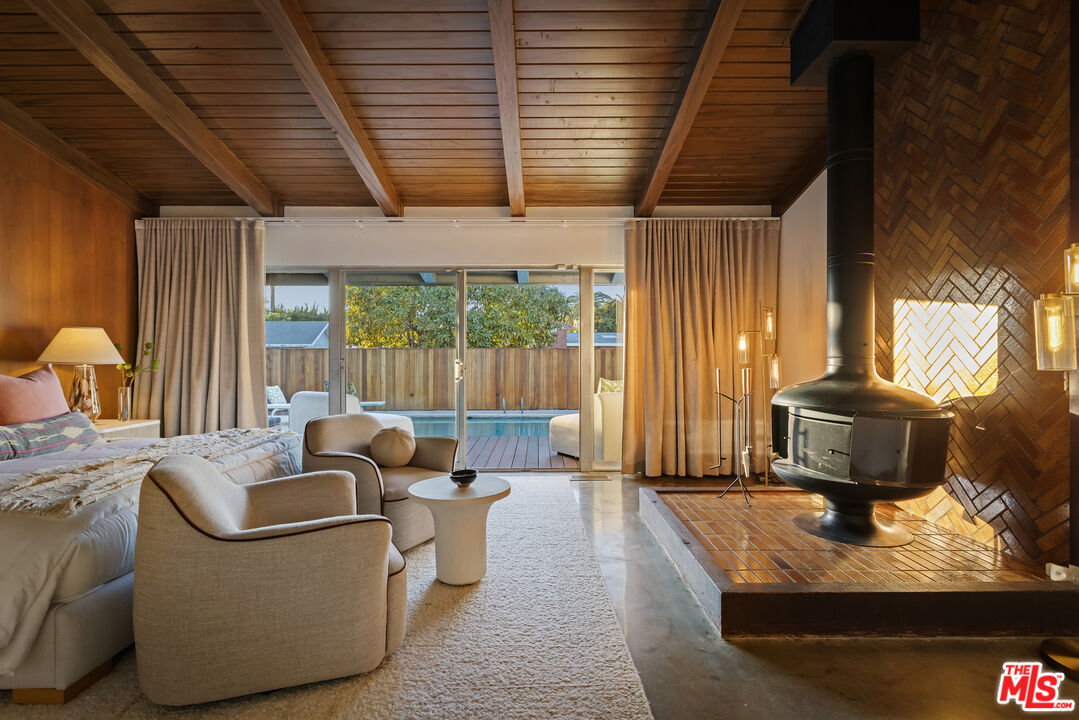9440 Gallatin Road Downey, CA 90240 - Photo 30 of 55 a living room with furniture and a fireplace