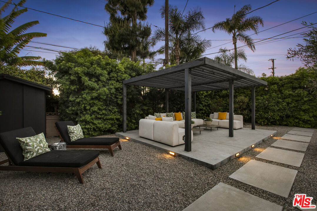 9440 Gallatin Road Downey, CA 90240 - Photo 48 of 55 a view of a patio with couches and a fire pit