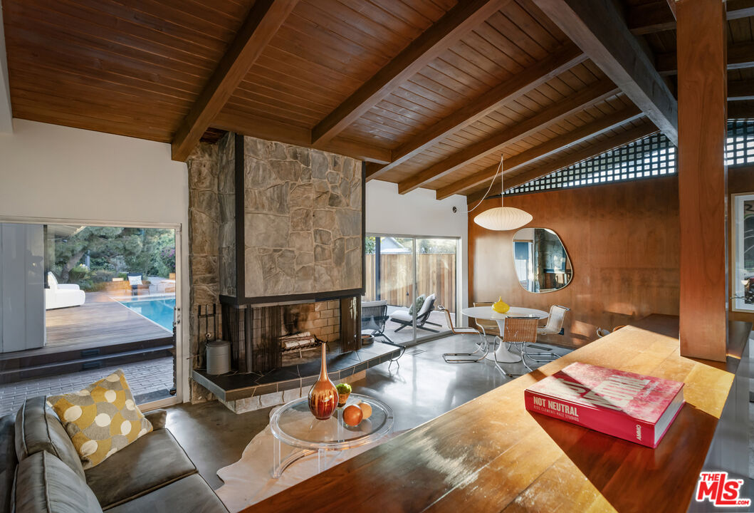 9440 Gallatin Road Downey, CA 90240 - Photo 8 of 55 a living room with furniture and a fireplace