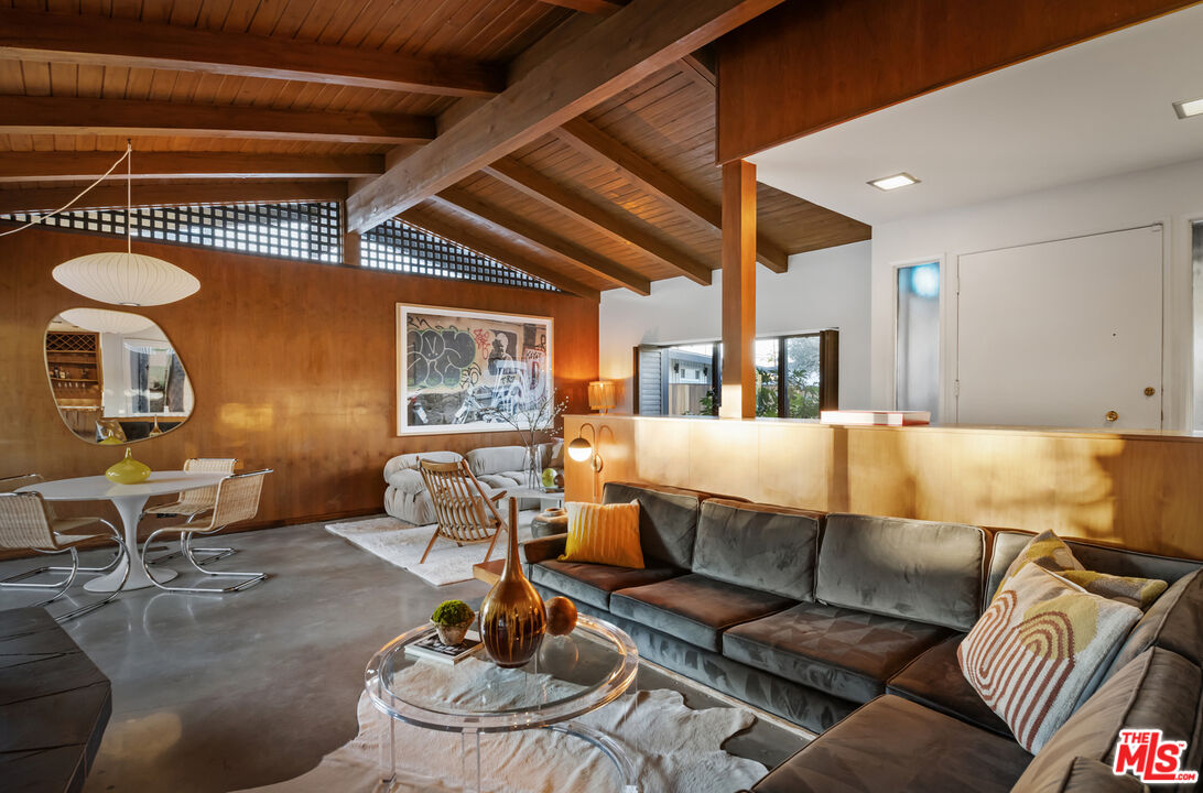 9440 Gallatin Road Downey, CA 90240 - Photo 9 of 55 a living room with furniture and a large window