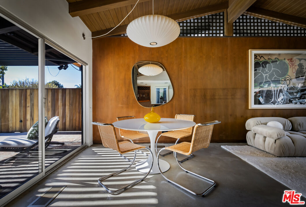 9440 Gallatin Road Downey, CA 90240 - Photo 10 of 55 a living room with furniture and a large window