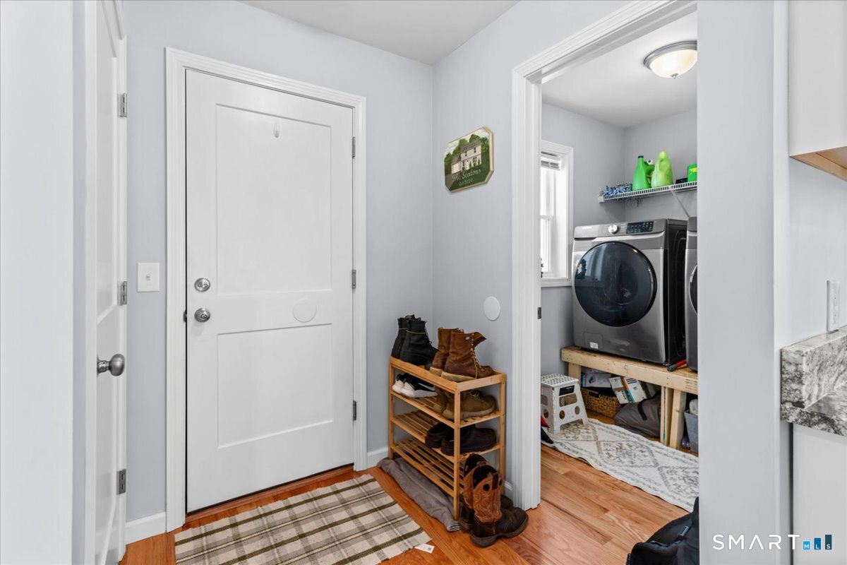 26 2nd Street Lebanon, CT 06249 - Photo 12 of 37 a view of walk in closet with clothes and shoes