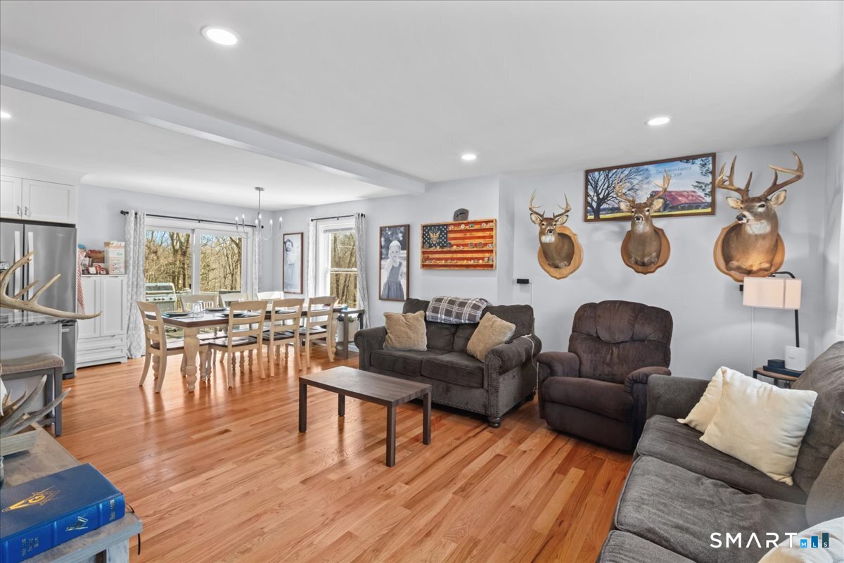 26 2nd Street Lebanon, CT 06249 - Photo 5 of 37 a living room with furniture and wooden floor