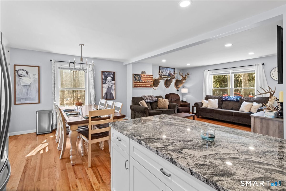26 2nd Street Lebanon, CT 06249 - Photo 8 of 37 a living room with furniture and a wooden floor