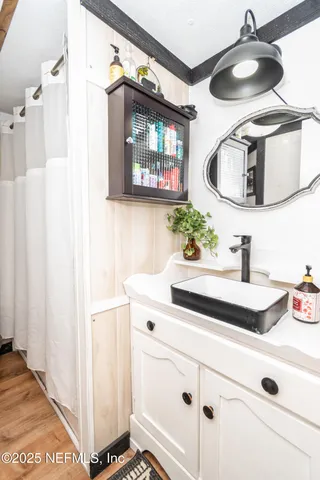 a kitchen with a sink and a stove