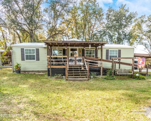 a view of a house with a swimming pool
