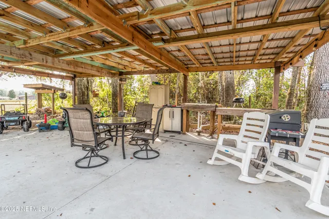 a view of a chairs and table in a room