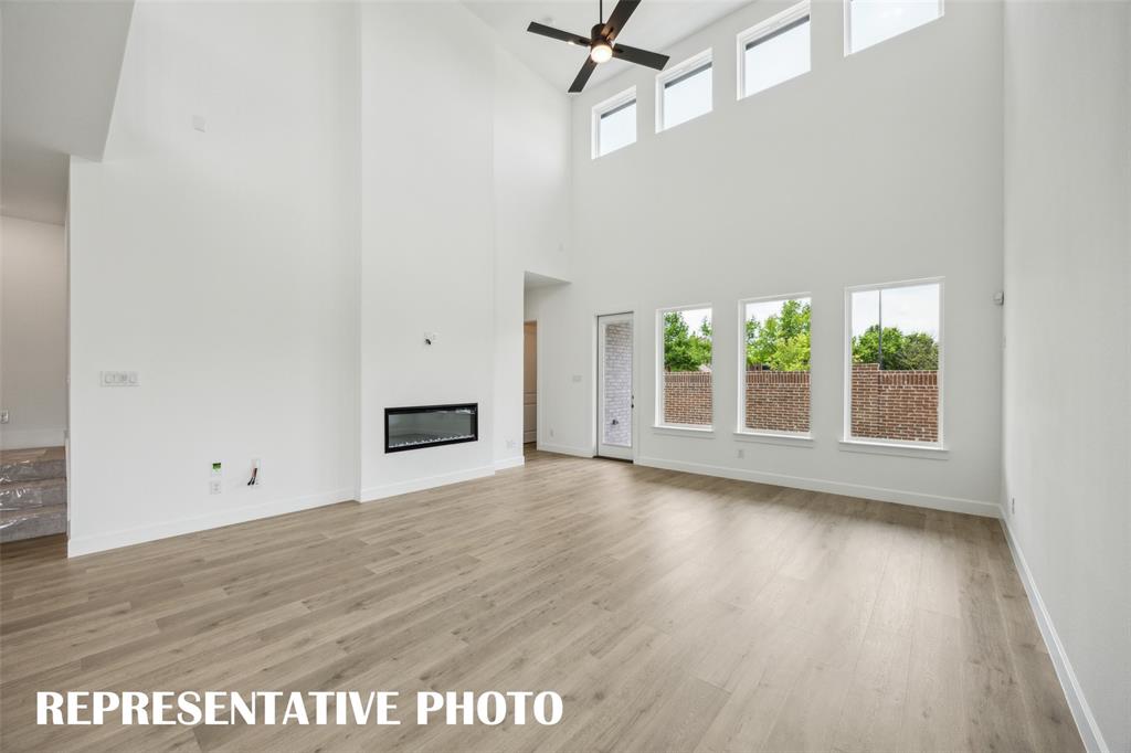9530 Keep Street Frisco, TX 75035 - Photo 6 of 18 wooden floor in an empty room with a window