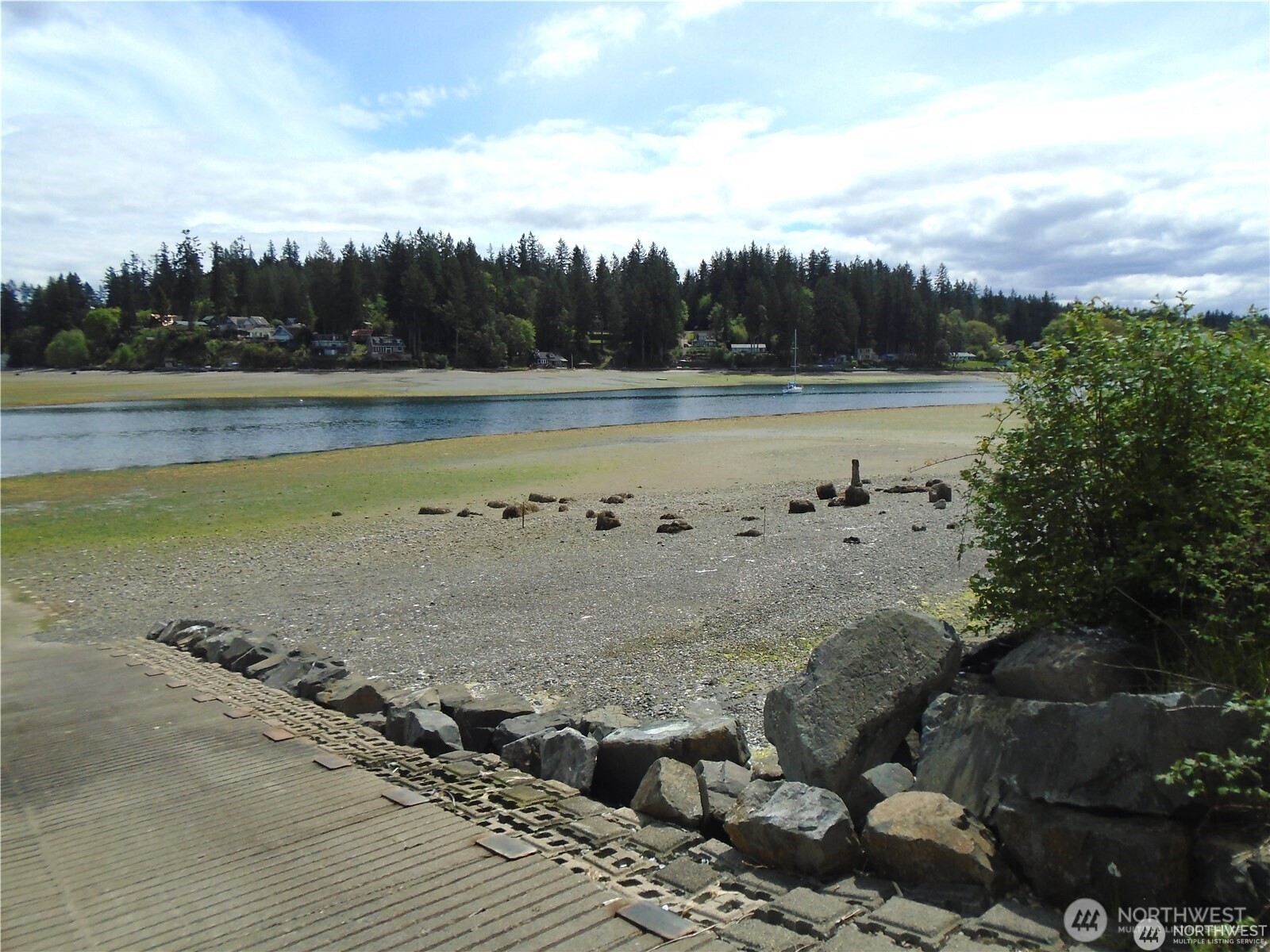 16456 Hoff Road Northwest Lakebay, WA 98349 - Photo 12 of 15 a view of a lake with a big yard