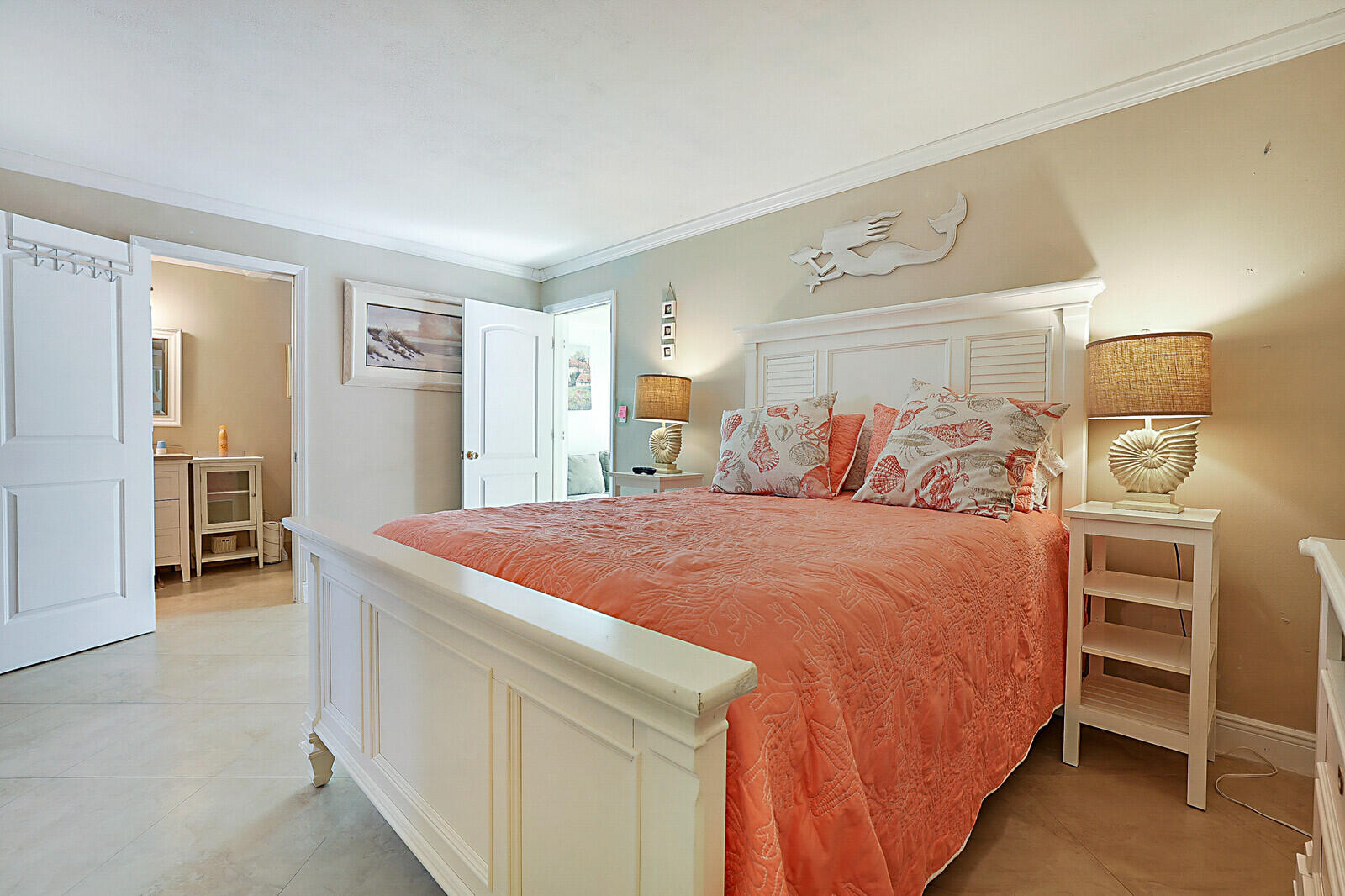 170 High Point Boulevard, Unit B Boynton Beach, FL 33435 - Photo 18 of 26 a bedroom with a bed and a cabinets