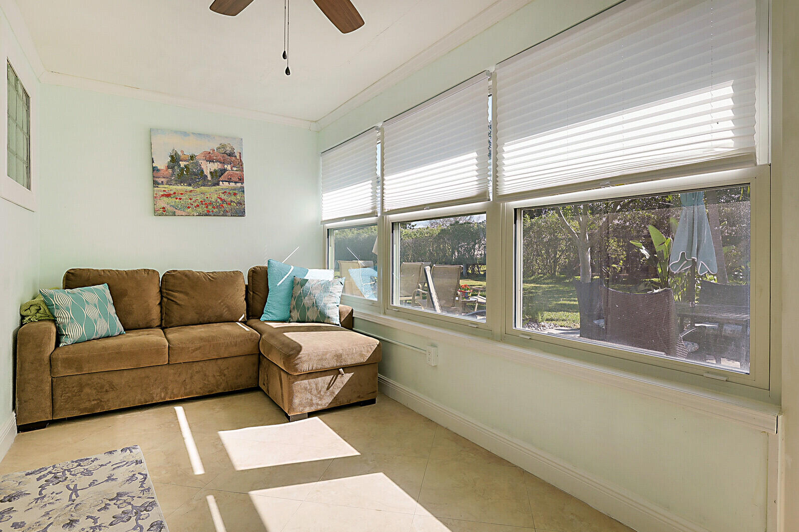 170 High Point Boulevard, Unit B Boynton Beach, FL 33435 - Photo 20 of 26 a living room with furniture and a large window