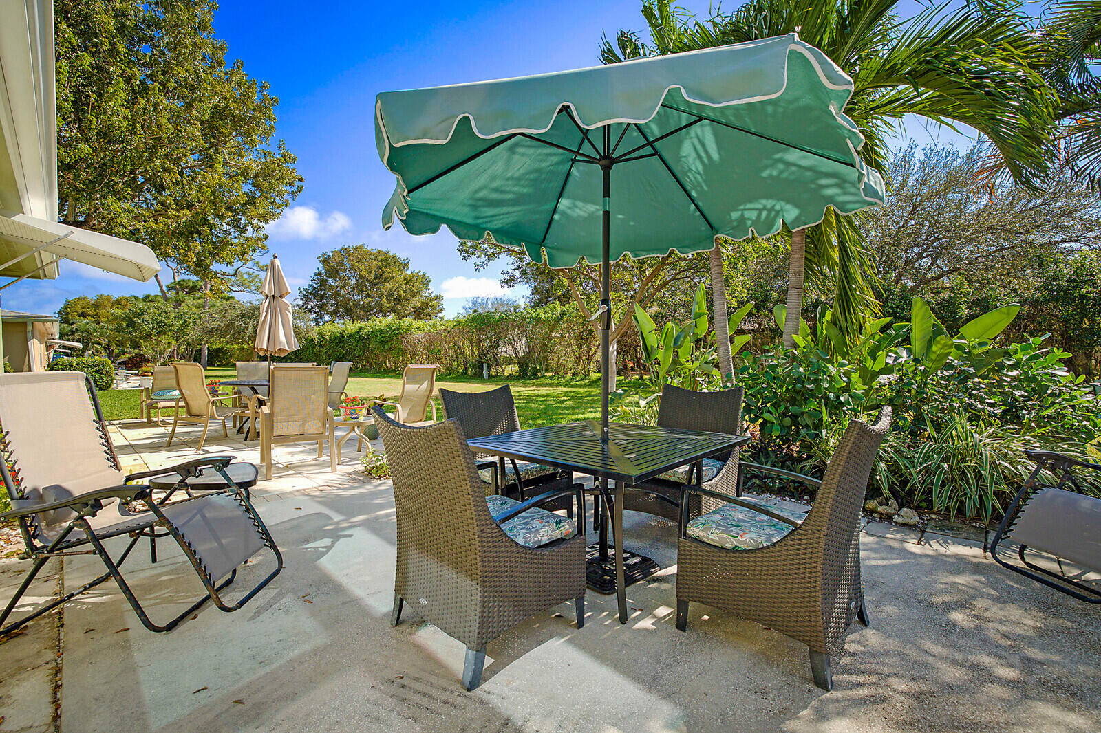 170 High Point Boulevard, Unit B Boynton Beach, FL 33435 - Photo 23 of 26 a view of an outdoor sitting area with furniture