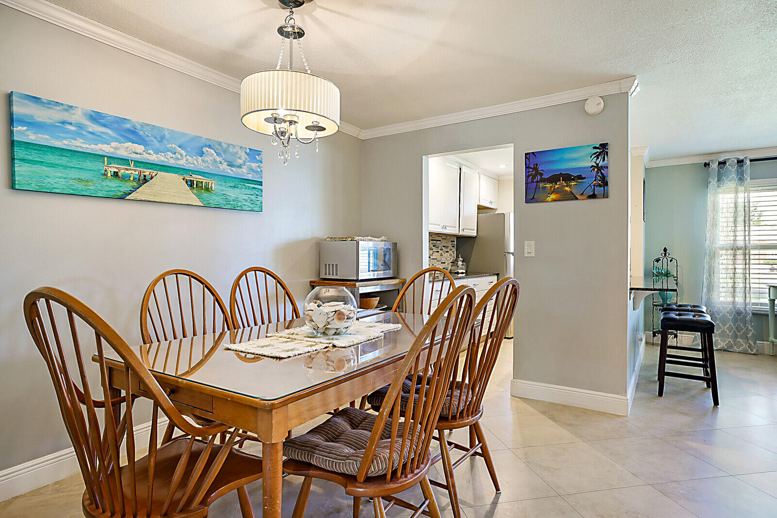 170 High Point Boulevard, Unit B Boynton Beach, FL 33435 - Photo 9 of 26 a view of a dining room with furniture