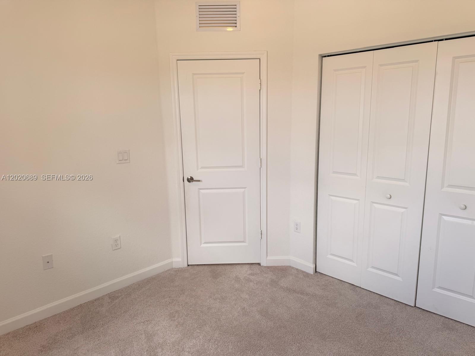 12875 Southwest 231st Terrace Miami, FL 33170 - Photo 22 of 25 an empty room with closet area
