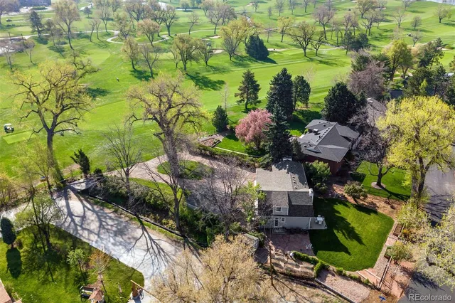 an aerial view of residential house with outdoor space and lake view