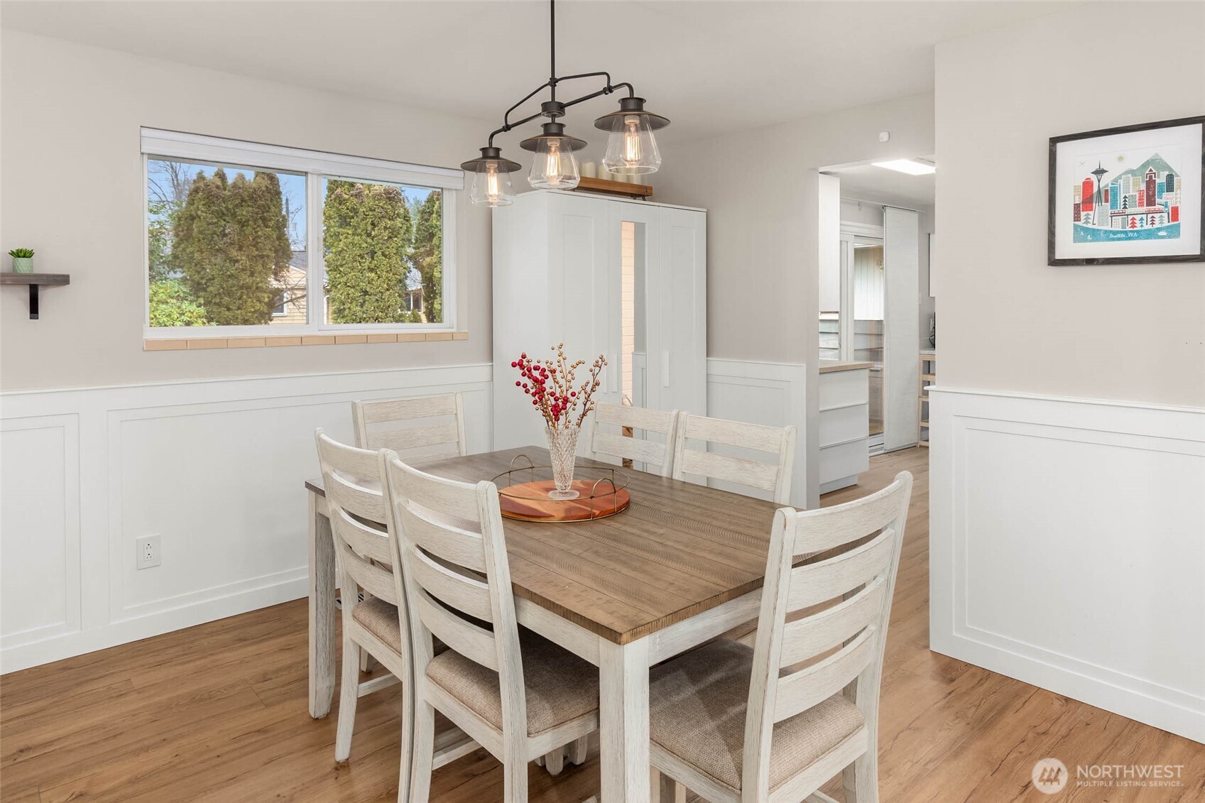 4726 South Victor Street Seattle, WA 98178 - Photo 11 of 30 a view of a dining room with furniture window and wooden floor