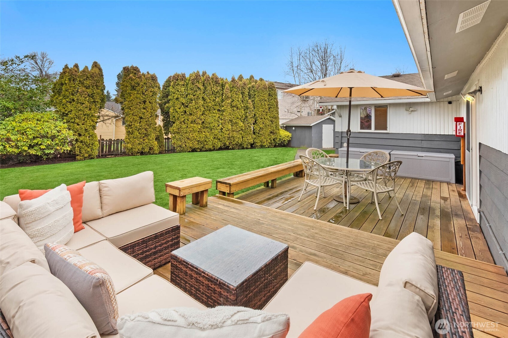 4726 South Victor Street Seattle, WA 98178 - Photo 24 of 30 a view of a patio with couches and umbrella