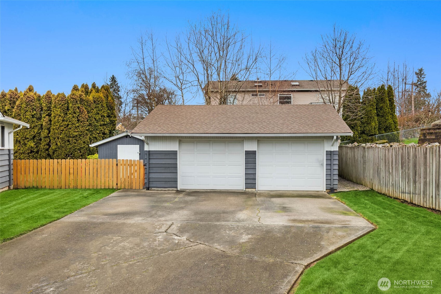 4726 South Victor Street Seattle, WA 98178 - Photo 28 of 30 a view of a house with a garage