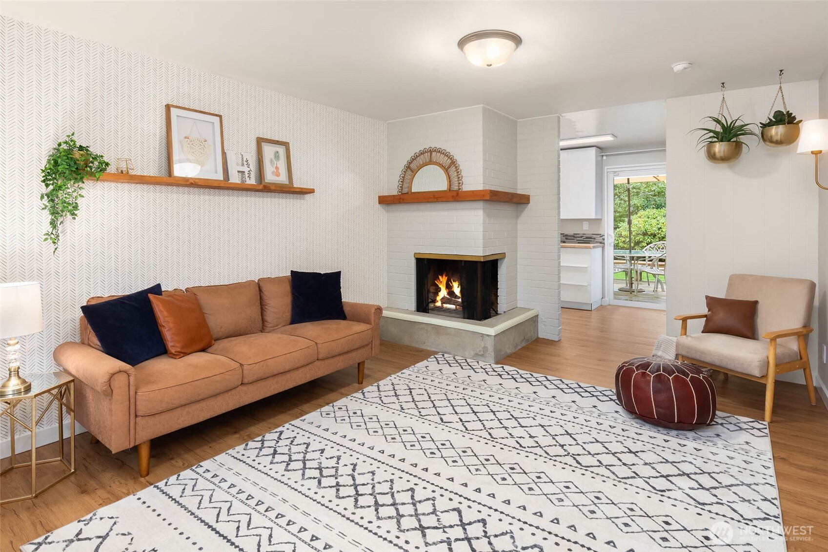 4726 South Victor Street Seattle, WA 98178 - Photo 3 of 30 a living room with furniture and a fireplace