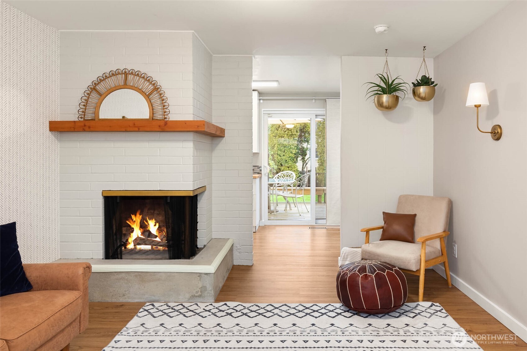 4726 South Victor Street Seattle, WA 98178 - Photo 4 of 30 a living room with furniture and a fireplace