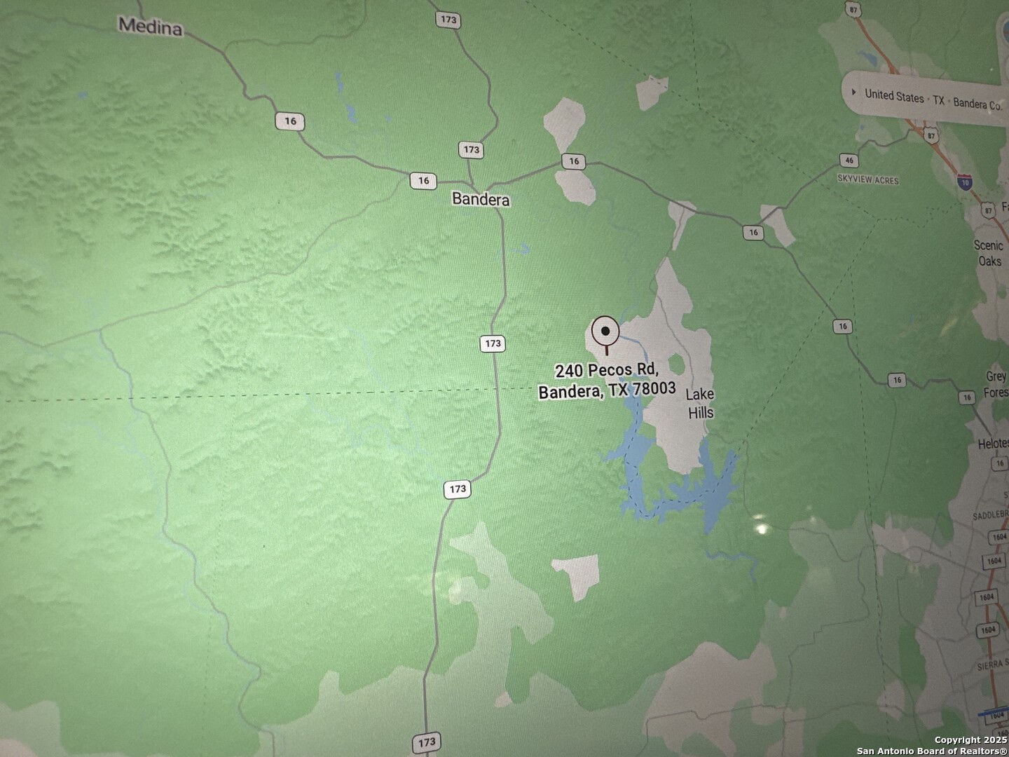 240 Pecos Bandera, TX 78003 - Photo 3 of 4 a bathroom with a sink and mirror