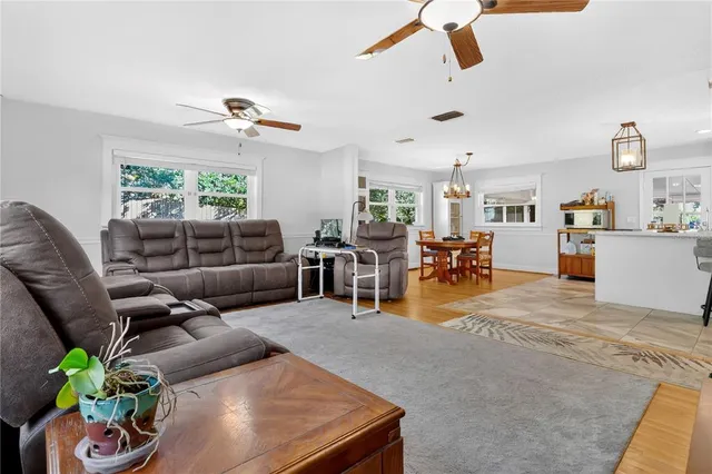 a living room with furniture and a window