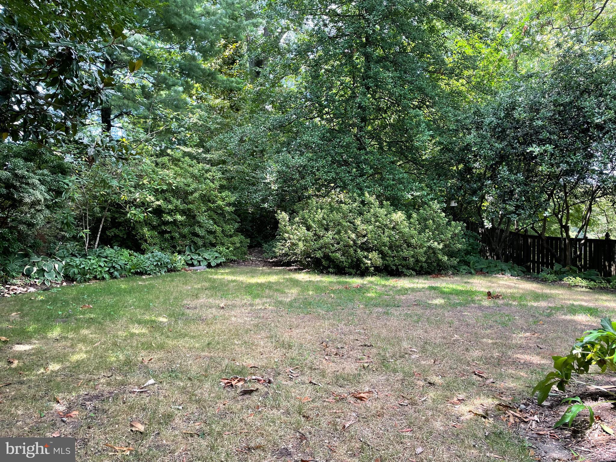 2266 48th Street Northwest Washington, DC 20007 - Photo 23 of 28 a view of outdoor space with deck and yard