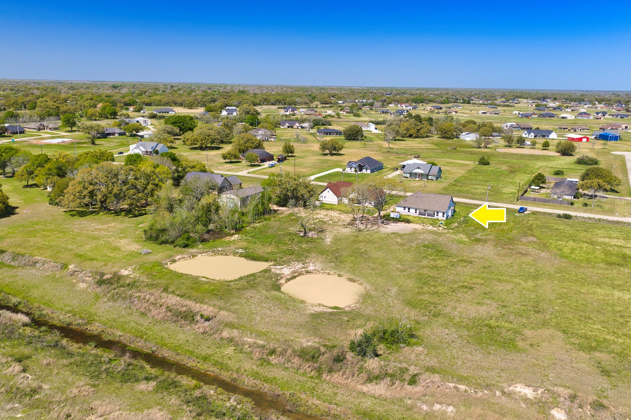 925 Buffalo Trail Angleton, TX 77515 - Photo 44 of 45 a view of residential houses with outdoor space and swimming pool