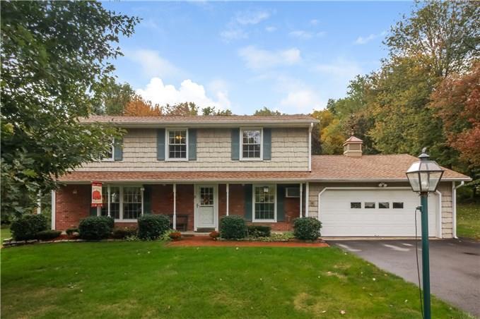 9 Brookhedge Road Trumbull, CT 06611 - Photo 1 of 1 front view of a house with a yard