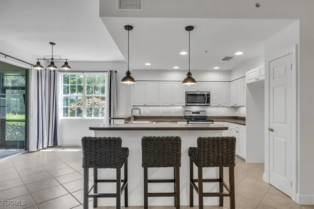 $340,000 | 13121 Pebblebrook Point Circle, Unit 102, Fort Myers, FL 33905