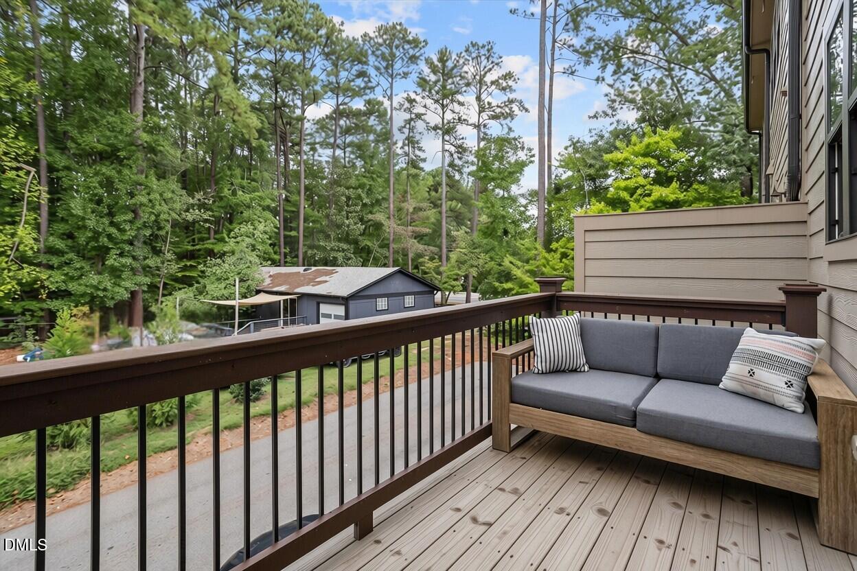 1607 Wooster Street Raleigh, NC 27607 - Photo 33 of 39 Balcony Off Kitchen *AI Modified